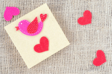Boxes for gifts and paper heart on the sackcloth