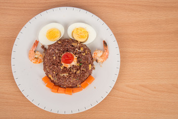 Fired brown rice with shrimp, carrot  and boiled egg healthy clean food none oil added low fat