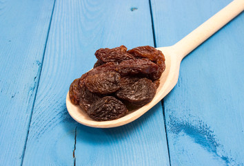 the raisins on a blue board