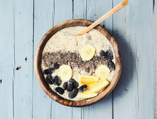 smoothies bowl with banana, ground flax and mulberry