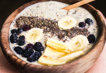 smoothies bowl with banana, ground flax and mulberry