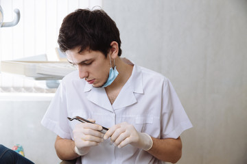 Professional dentist doing teeth checkup on female patient dental surgery. Concept of healthy