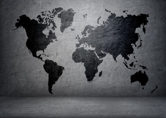 Black-colored world map on concrete wall
