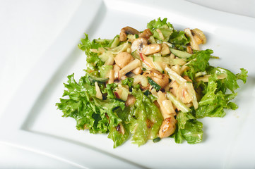 Dish in a cafe / restaurant. Delicious and hearty salad.