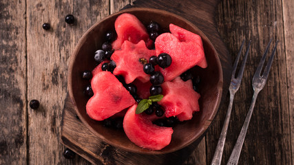 Summer fruit salad of watermelon and berries. Slices of watermelon