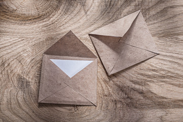 Vintage post envelopes on wooden board