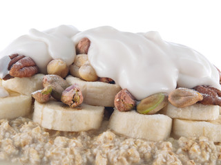oat flakes in soy milk with banana and nuts and lupin yogurt