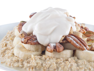 oat flakes in soy milk with banana and nuts and lupin yogurt
