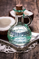 Coconut on wooden table.Vintage filter. Organic healthy food concept.Beauty and SPA concept.