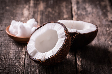 Coconut on wooden table.Vintage filter. Organic healthy food concept.Beauty and SPA concept.