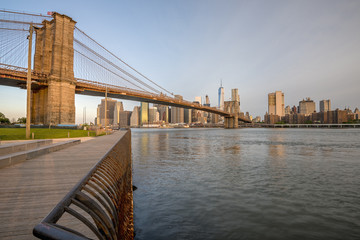 Walkway under the Brooklyn Bridge with the New York Skyline