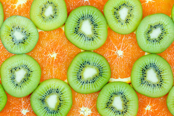 Kiwi and orange slices texture pattern for background