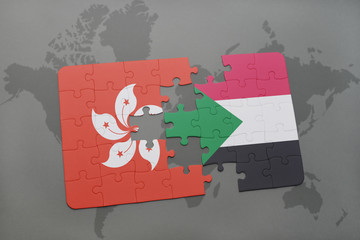puzzle with the national flag of hong kong and sudan on a world map background.