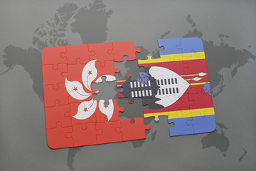 puzzle with the national flag of hong kong and swaziland on a world map background.