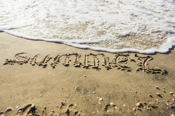 Summer word on sand