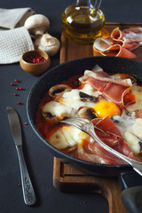 Fried eggs with mushrooms and meats