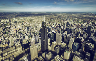 Fototapeta na wymiar Chicago downtown skyscrapers overhead view. Tilt shift effect