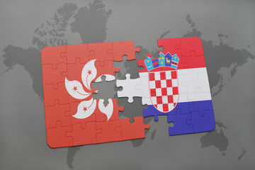 puzzle with the national flag of hong kong and croatia on a world map background.