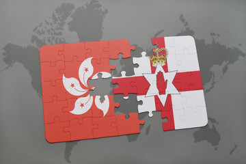 puzzle with the national flag of hong kong and northern ireland on a world map background.