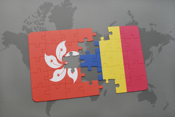 puzzle with the national flag of hong kong and romania on a world map background.