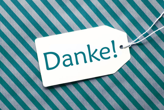 Label On Turquoise Wrapping Paper, Danke Means Thank You