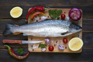 Cooking background, fish on the blackboard, top view