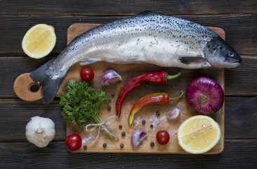 Cooking background, fish on the blackboard, top view