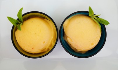 Scoop of peach and lemon verbena sorbet