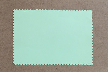 vintage of cardboard on brown background and copy specs.