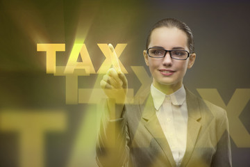 Businesswoman in business tax concept