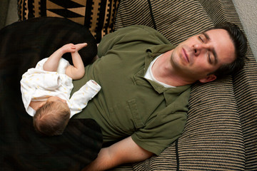 Newborn Sleeping On Sleeping Dad