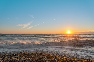 Obraz premium Ocean shore at sunset