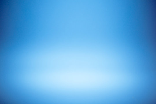 Blue gradient abstract studio wall for backdrop design for product or text over