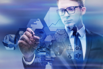 Businessman pressing virtual buttons in business concept