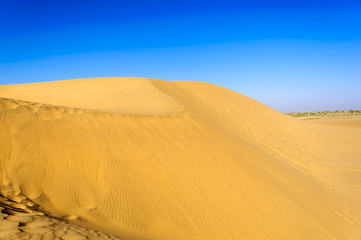 Fototapeta na wymiar Sand dunes, SAM dunes of Thar Desert of India with copy space