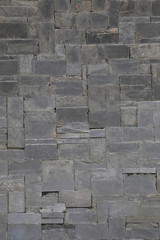 old stone wall Texture in weathered and have natural surfaces.