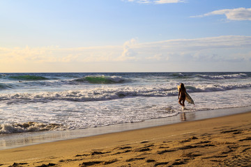 Nag's Head Beach in the morning with surfers
