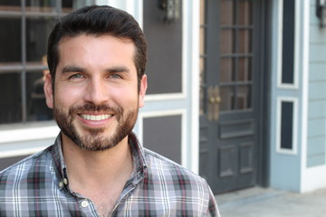 Closeup portrait of a happy young man smiling