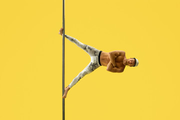 Acrobat performs trick and his face is relaxed