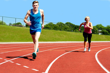 Fototapeta premium Running race practicing in athletics stadium.