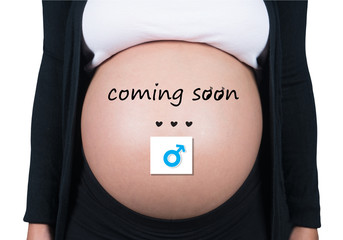 coming soon. pregnant woman with male symbol in front of her bel
