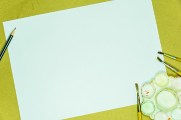 White paper copy space and pencil with paintbrush, background us