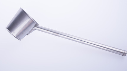 ladle or metallic ladle on a background.