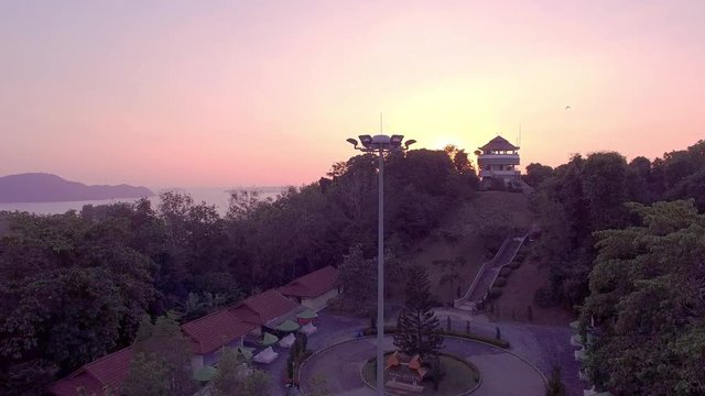 aerial photography on khao khad view point Phuket
sunset at Khao Khad view point the sun going down to the roof view point building Khao Khad view point can  see around Phuket island 360 degree
