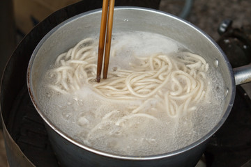 Close up of Cooking Vietnamese noodle with soup containing rice