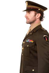 Confident young army man posing over white