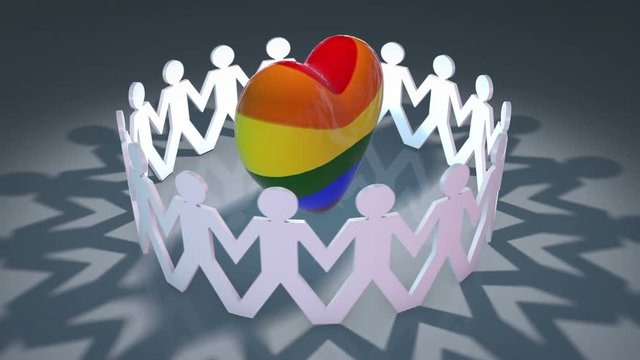 Paper chain people holding hands around big heart in Pride rainbow colours