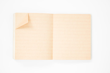 Opened blank brown notebooks and bookmark isolated
