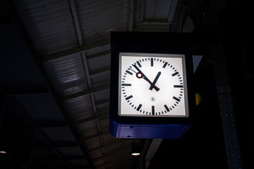 clock at a train station.