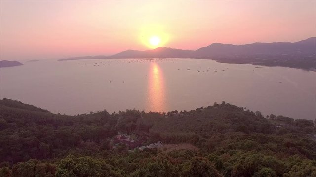 aerial photography on khao khad view point Phuket
sunset at Khao Khad view point the sun going down to the roof view point building Khao Khad view point can  see around Phuket island 360 degree